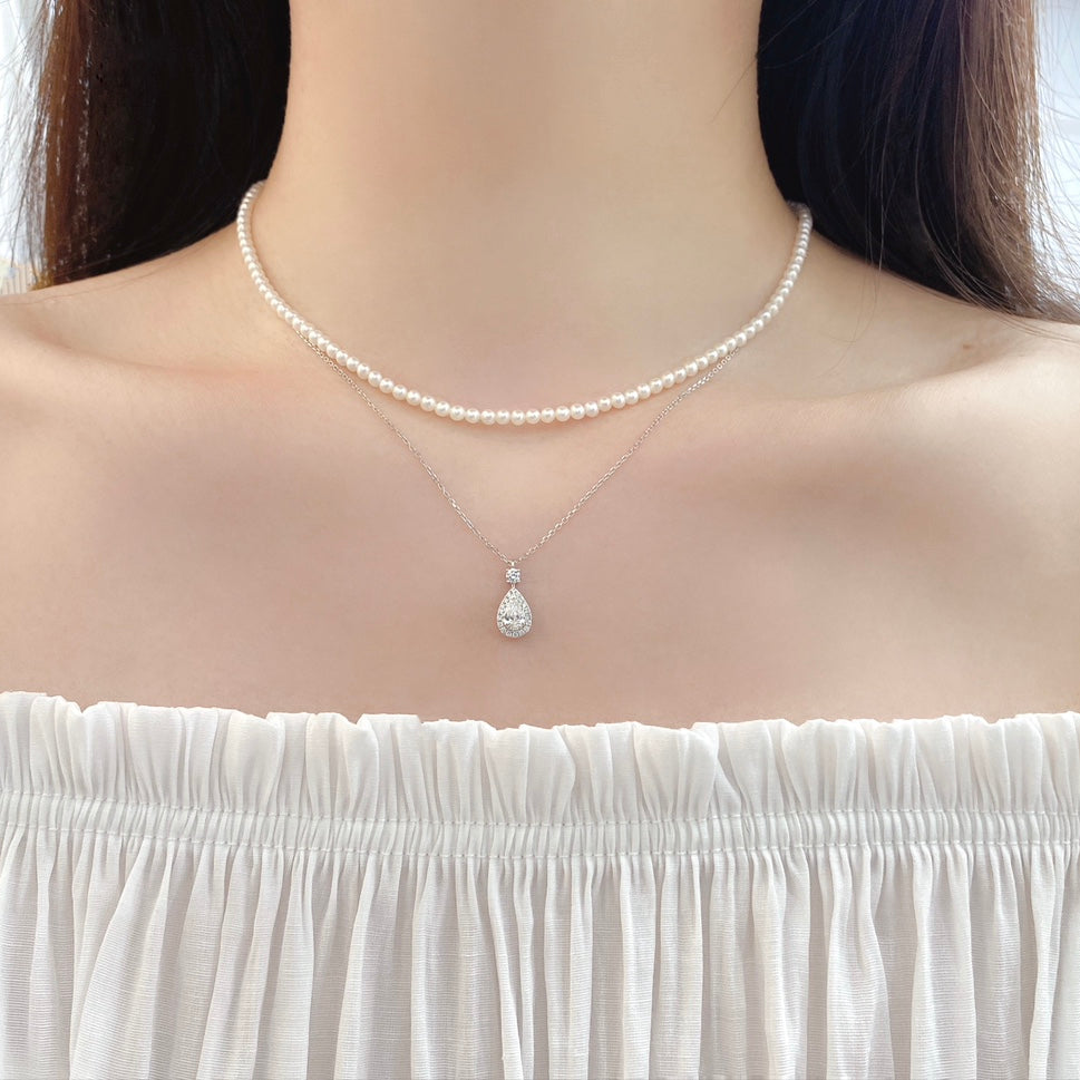 0.47ct Pear Halo Lab Grown Diamond Necklace in 14K Gold