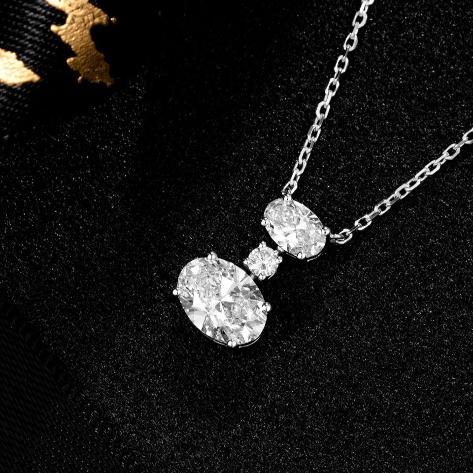 Vertically Graduated Three stone Oval Lab Grown Diamond Pendant Necklace 16-18 Inch in 14k White Gold