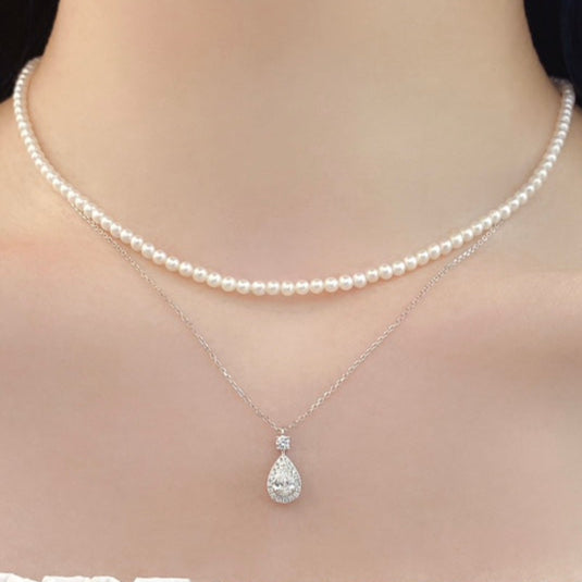0.47ct Pear Halo Lab Grown Diamond Necklace in 14K Gold
