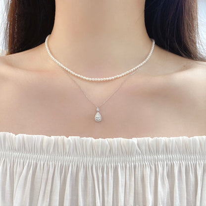 0.47ct Pear Halo Lab Grown Diamond Necklace in 14K Gold