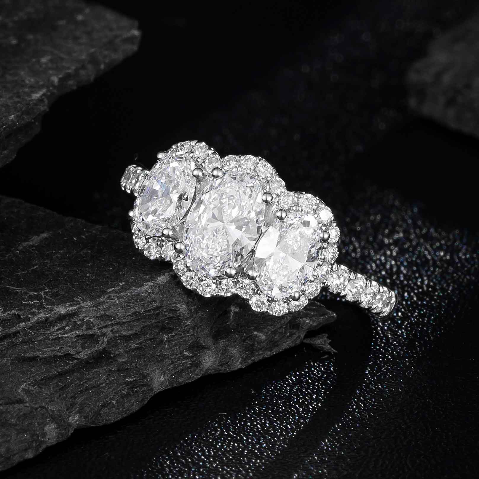 1ct Oval Diamond Three-Stone Halo Diamond Engagement Ring in Platinum