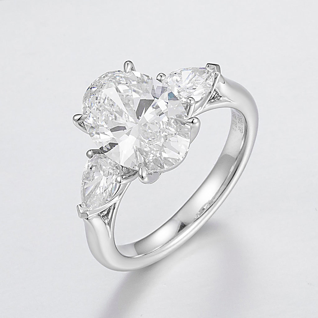 2 ct Three Stones Oval and Pear Cut Lab Created Diamond Engagement Ring in 14K White Gold